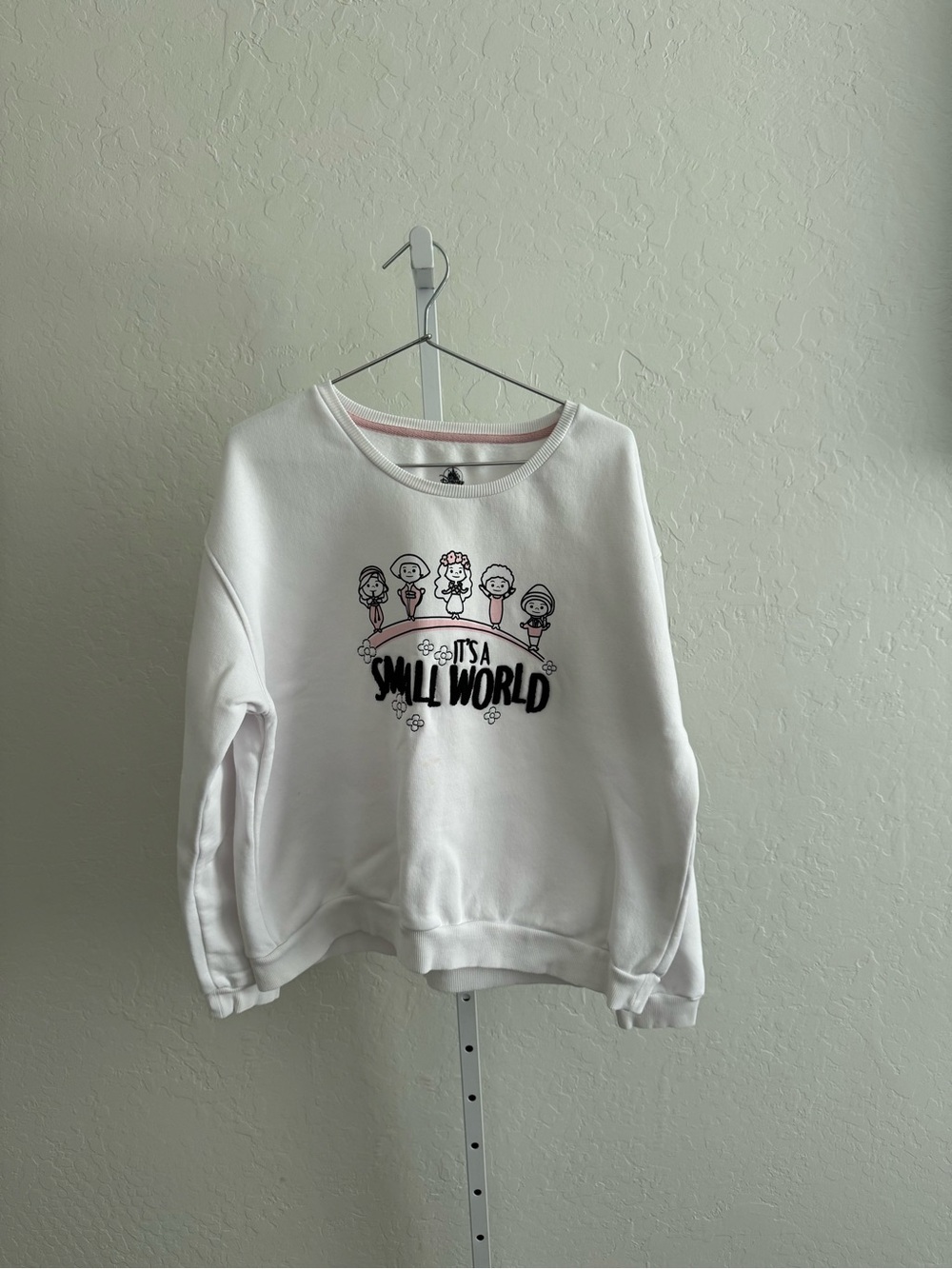 Disney White 'It's a Small World' Crewneck Sweatshirt with Pink Accent